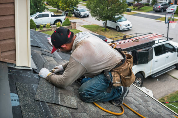 Professional Roofing technician working in Brooker, FL